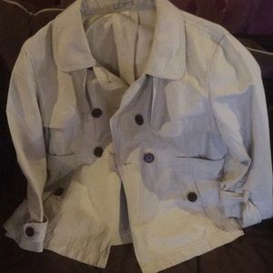 Light kahki shorty trench coat.